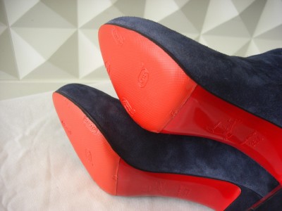 ルブタン(Louboutin)ロングブーツのハーフソール